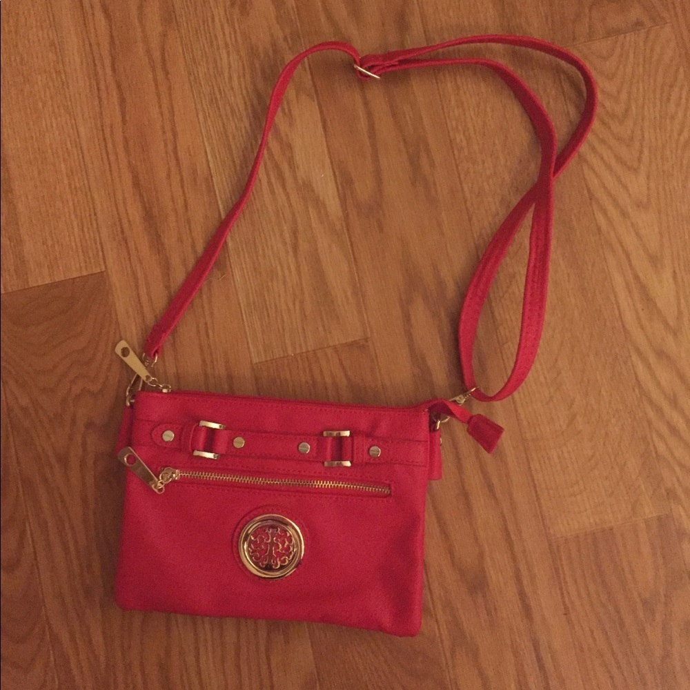 Red cross body purse with gold hardware